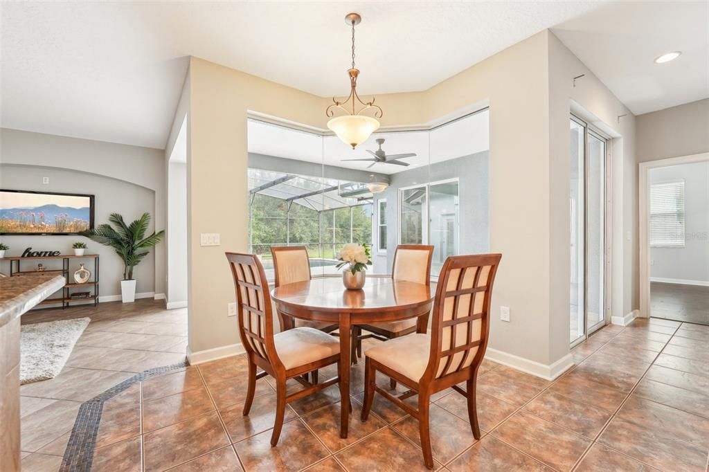 Eating nook with picture window overlooking your beautiful backyard