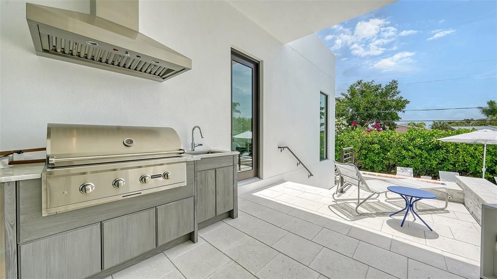 Rear terrace with outdoor kitchen