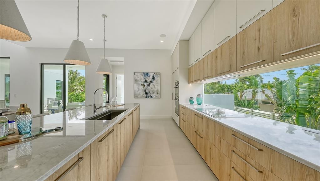 Kitchen with window backsplash