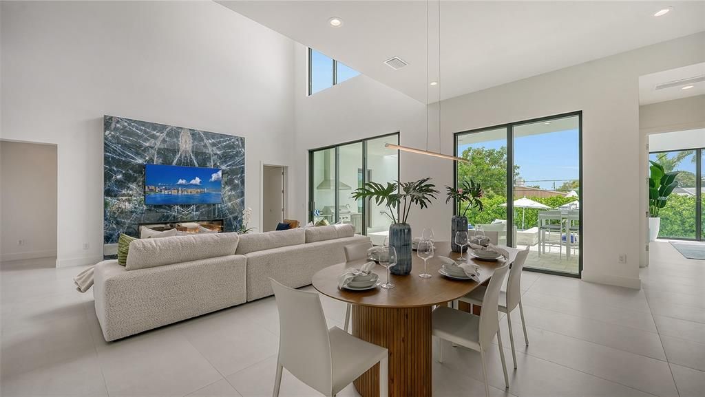 Feature wall in family room is showcased throughout the open floorpan