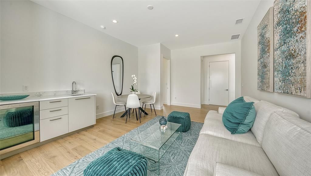 Wet bar and refridgerator in second floor living area