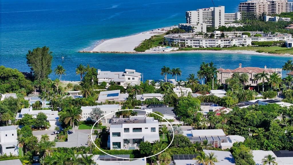 Aerial view with Longboat Pass and Longboat Key in background