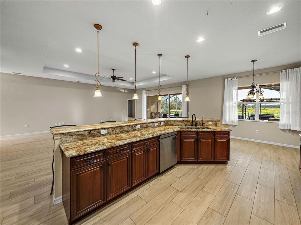 Views of living room and pool area