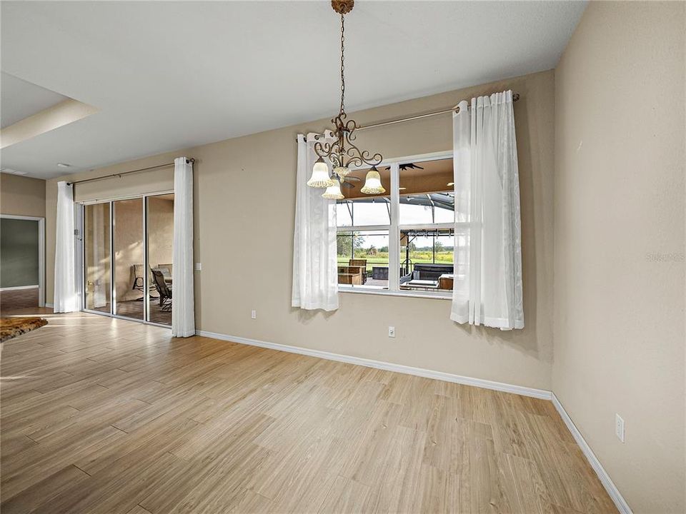 Kitchen nook with windows to outdoor kitchen