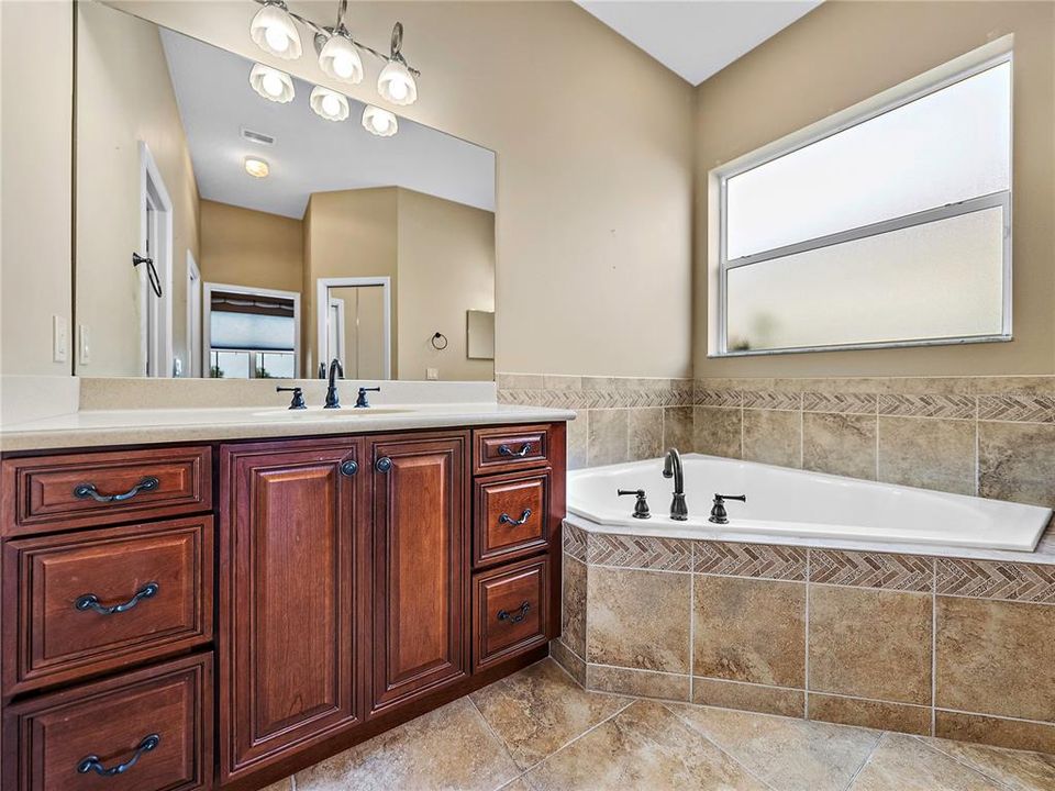 Tall vanity with solid countertop