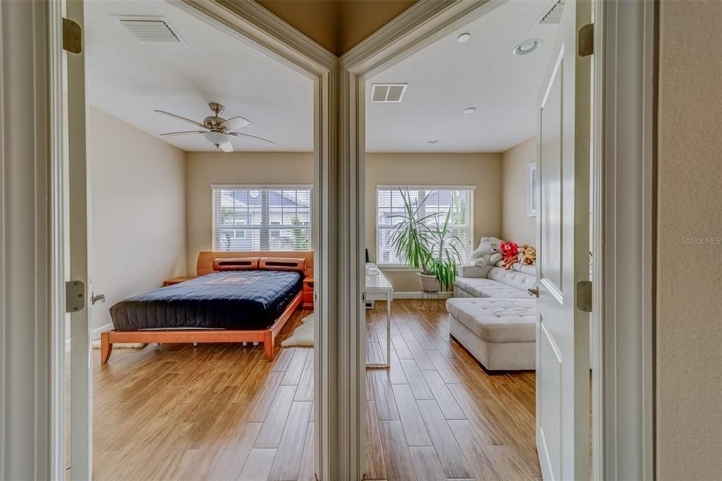 View of 2nd and 3rd bedroom from hallway