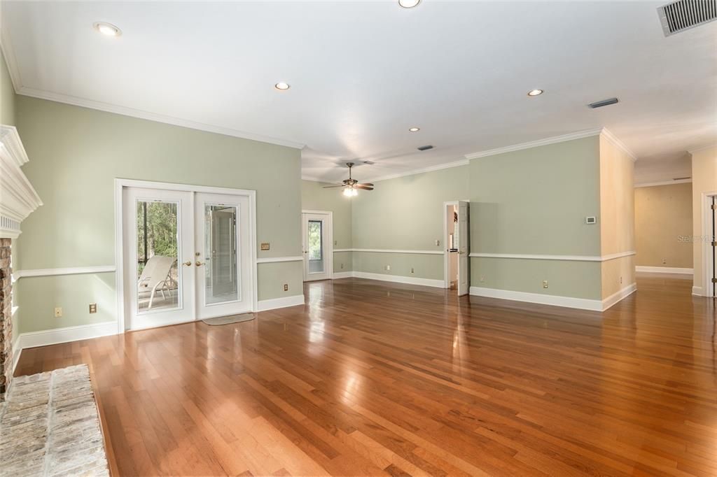 LOOKING FROM GREAT ROOM TOWARDS AREA FOR TABLE AND KITCHEN