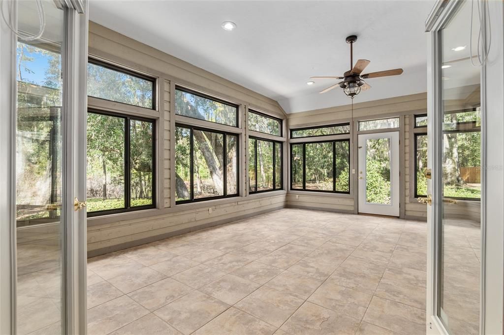 ENCLOSED AIR CONDITIONED LANAI WITH TILE FLOORING