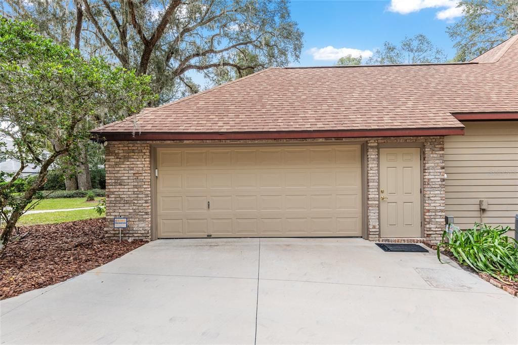 TWO CAR GARAGE WITH PERSONAL DOOR