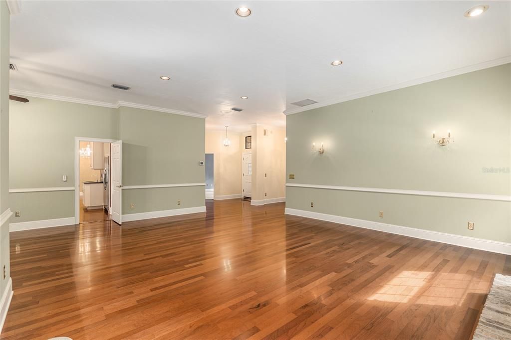 LOOKING FROM GREAT ROOM INTO KITCHEN AND TOWARDS FOYER