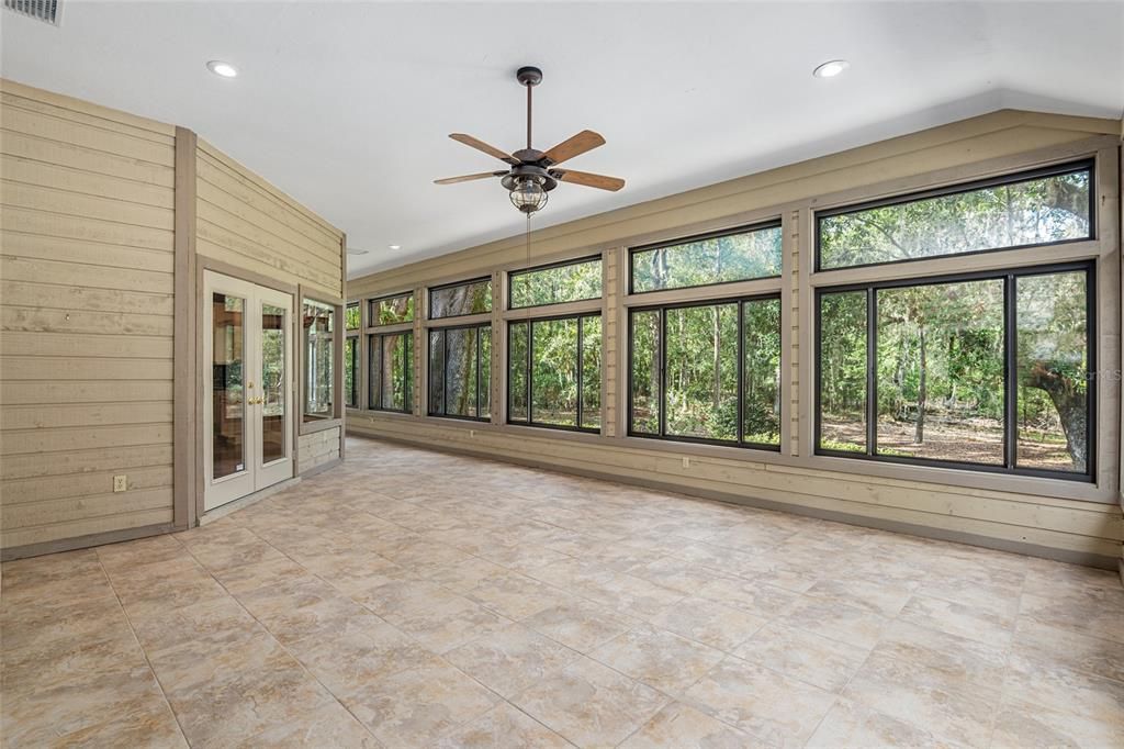 AN ABUNDANCE OF WINDOWS FOR VIEWS OF MAJESTIC OAKS