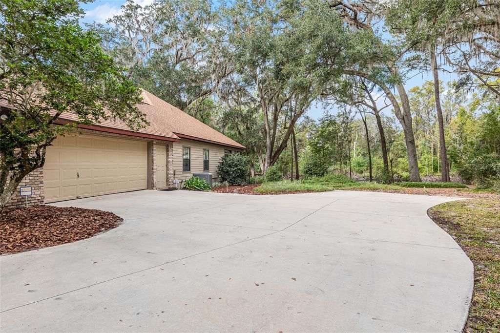 PLENTY OF EXTRA PARKING SPACE IN LONG DRIVEWAY