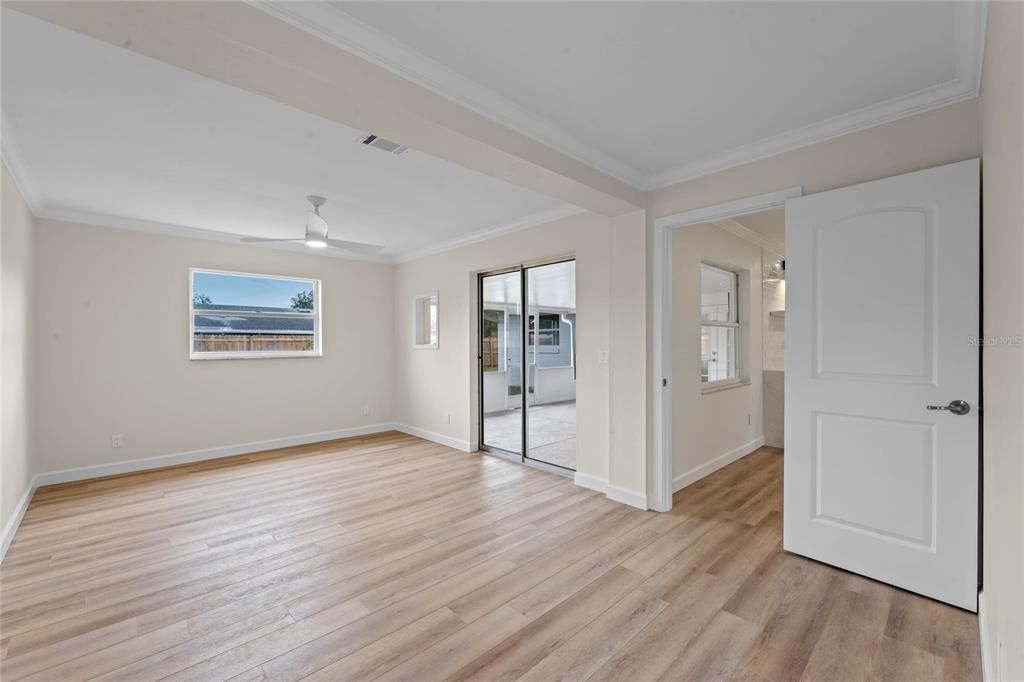 Primary bedroom with view into the breakfast nook