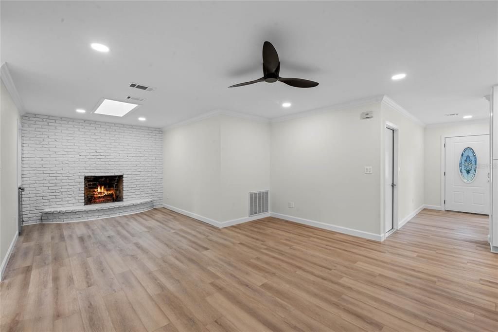 Wood burning fireplace with a built in area for the wine refrigerator makes this such a relaxing spot