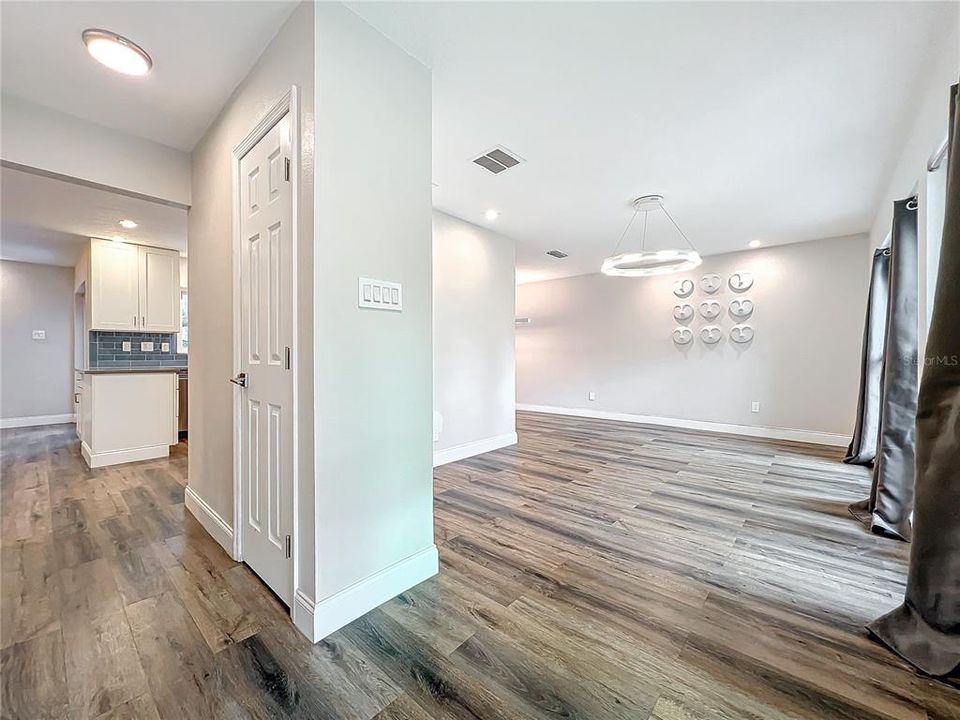 Inside front door. Living  / dining room to the right.