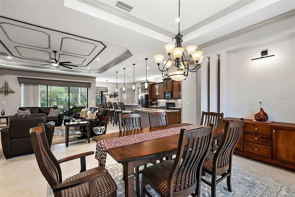 Carrying the built-in design element into the dining room, there are four lighted columns.