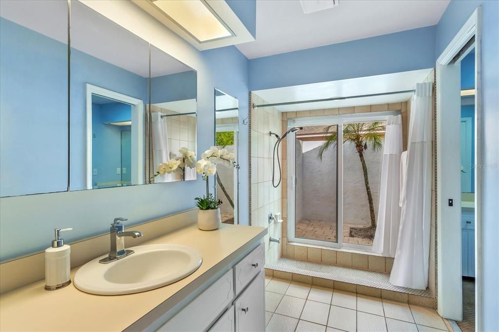 Shower overlooking private courtyard