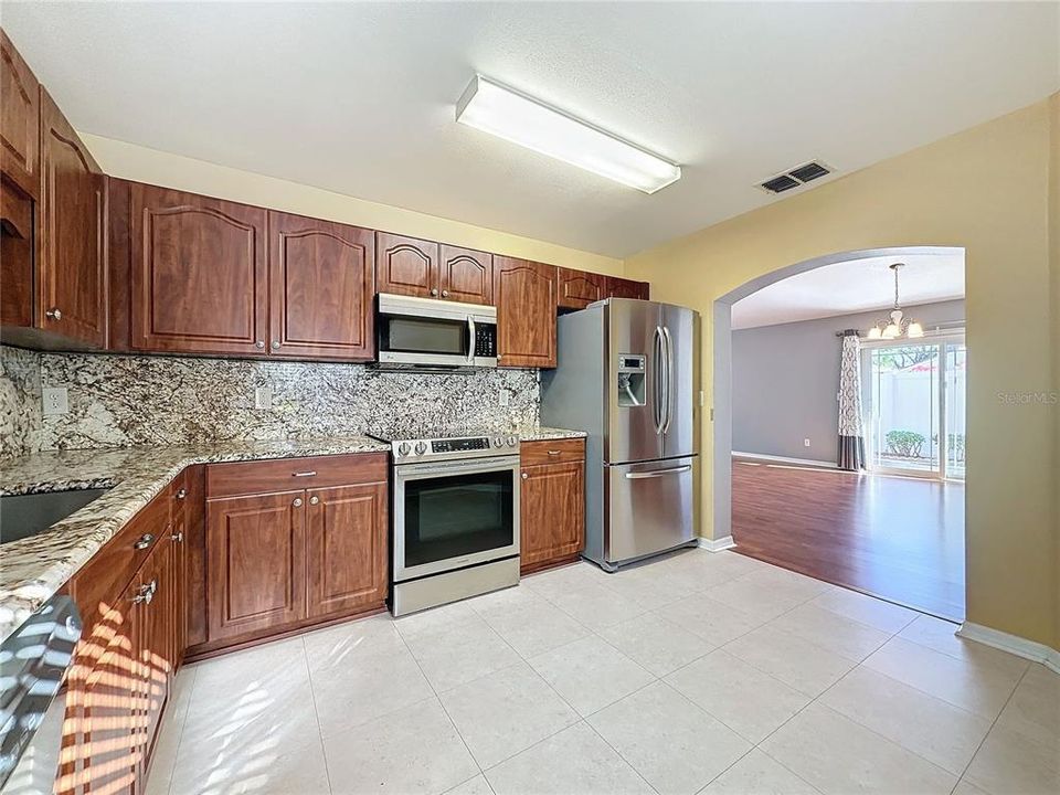 Kitchen opens to Dining area