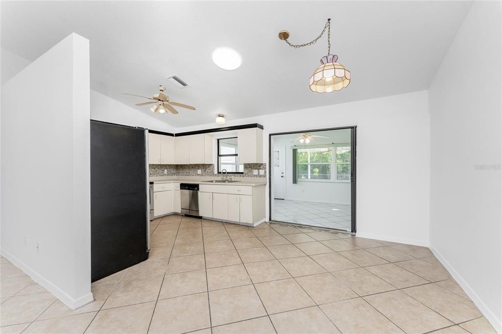 Kitchen and Dining Room with View of Lanai