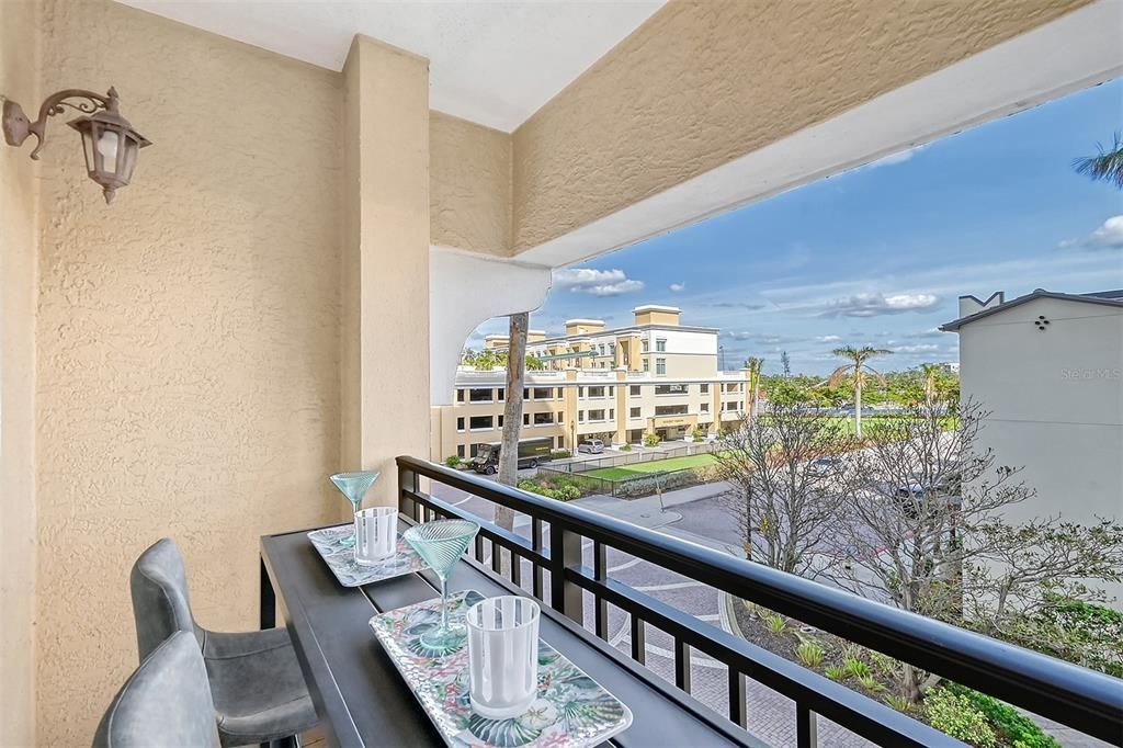 The open, covered balcony with views.