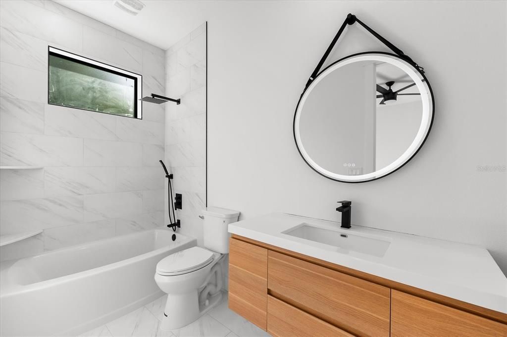 Bedroom #2 Featuring Modern Bathroom with Bath Tub