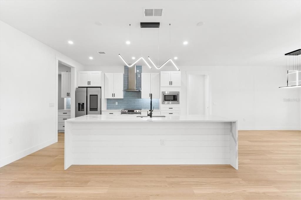 Contemporary Kitchen Featuring Large Island