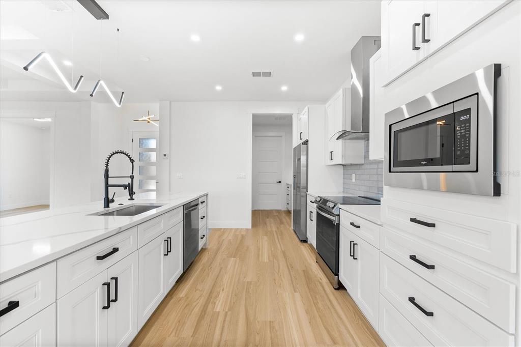 Contemporary Kitchen Featuring Built-in Oven