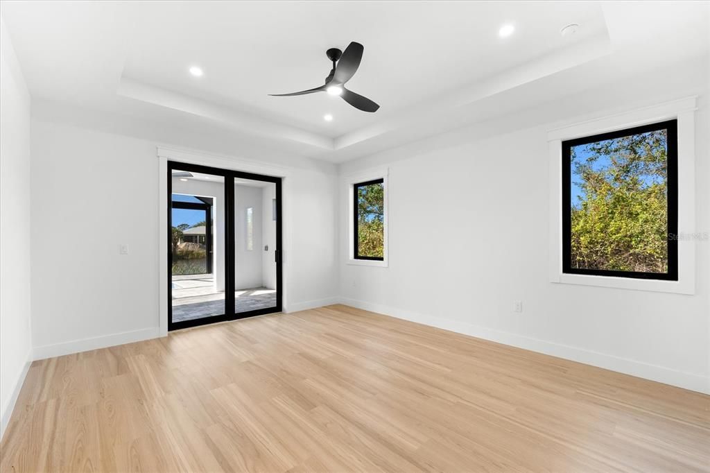 Primary Bedroom Featuring Sliders to Lanai