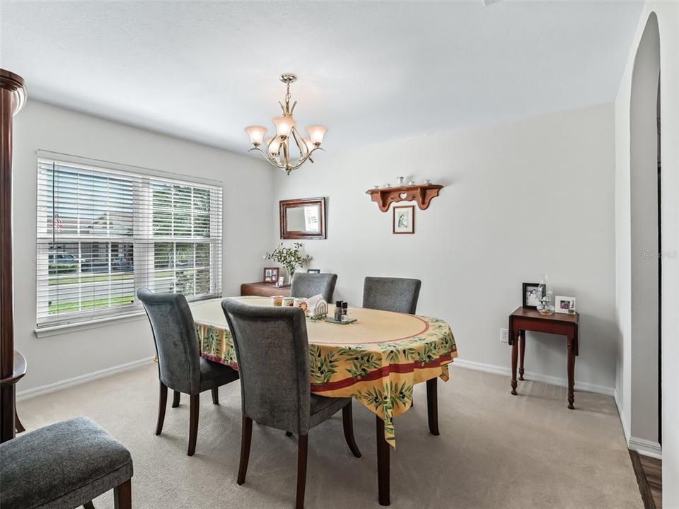 Dining rm w/Upgraded light fixture