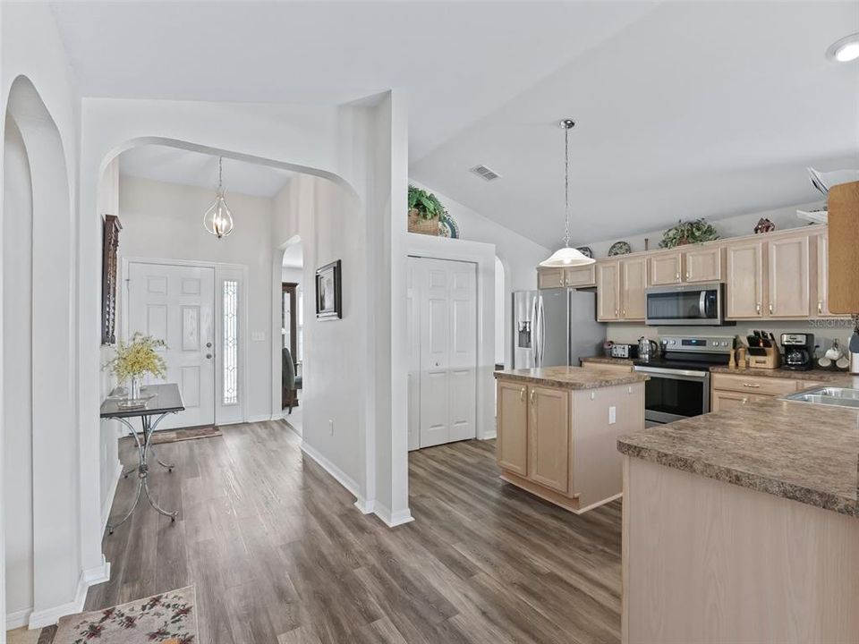 Large open kitchen w/Wood cabinets