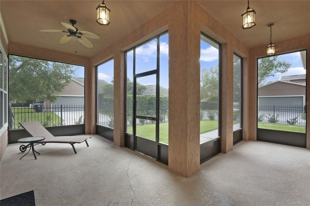 Screened in back patio, ceiling fans