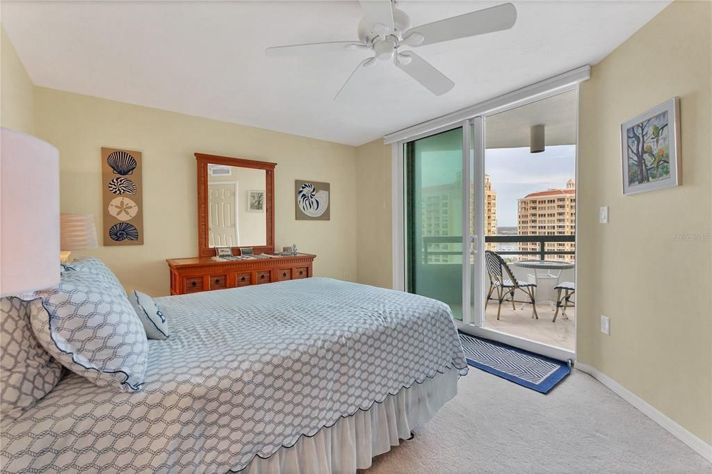 Guest bedroom #2 featuring sliding glass doors to the lanai.