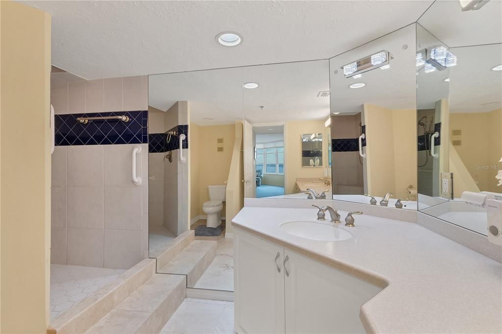 Owners ensuite bathroom featuring dual vanities and a walk-in shower.