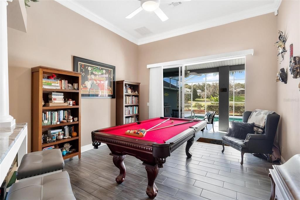 Living Area with Sliding Doors leading to Lanai and Pool Area