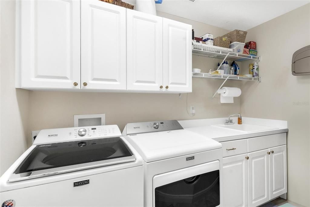 Laundry Room with Washer and Dryer which will convey