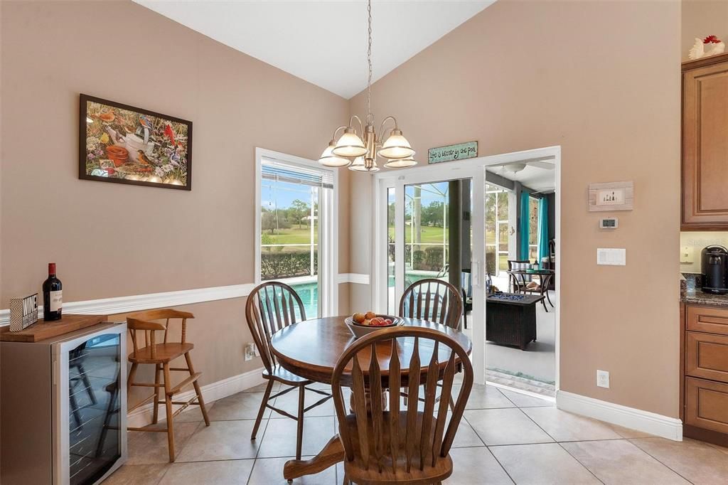 Dinette Area with Sliding Doors leading to Lanai and Pool Area