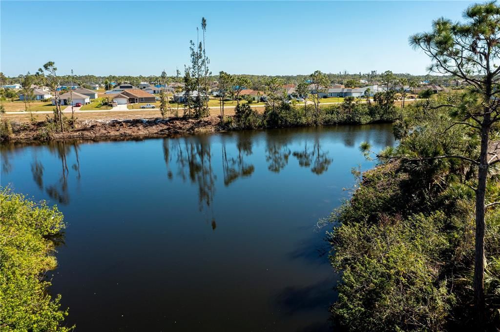 Looking at lot from down the intersecting Canal