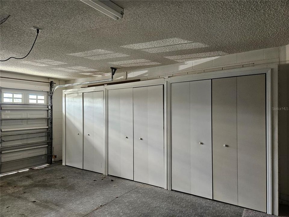 Lots of storage Cabinets in Garage