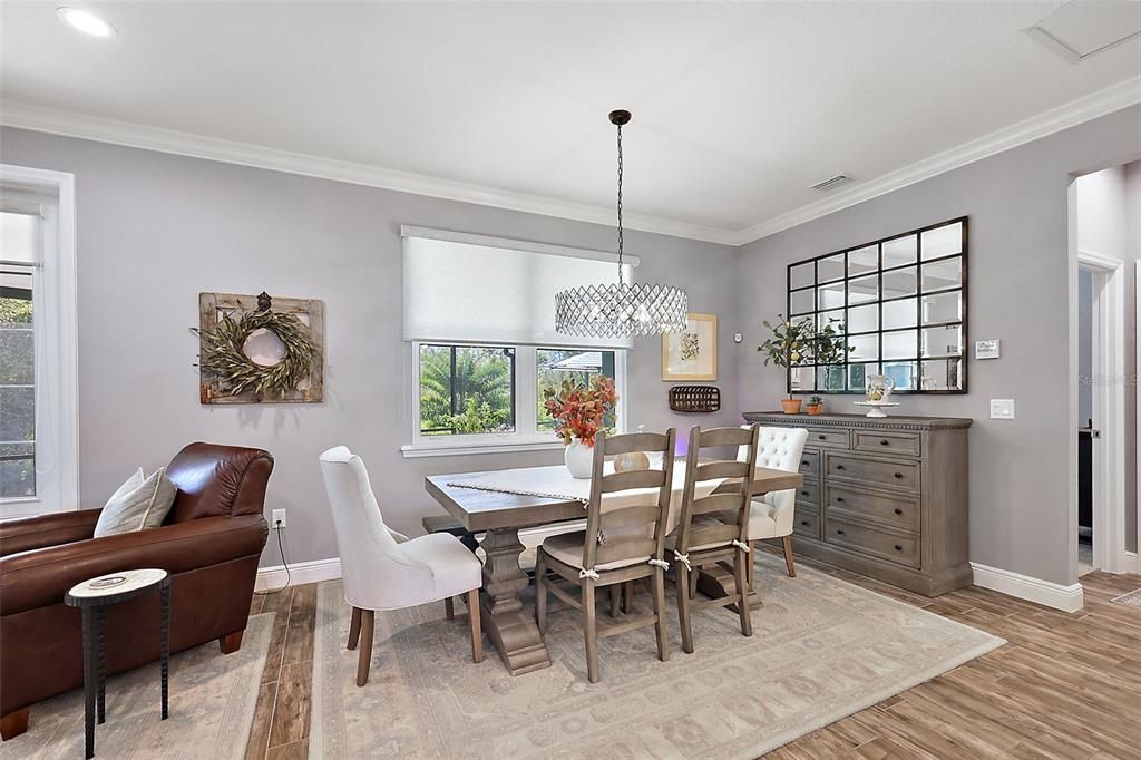 Dining room overlooks the pool and the nature views.