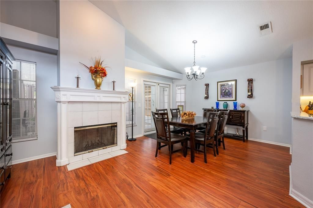 The larger dining area is open to the living room and has French door access to a generous SCREENED LANAI perfect for indoor/outdoor living and entertaining.