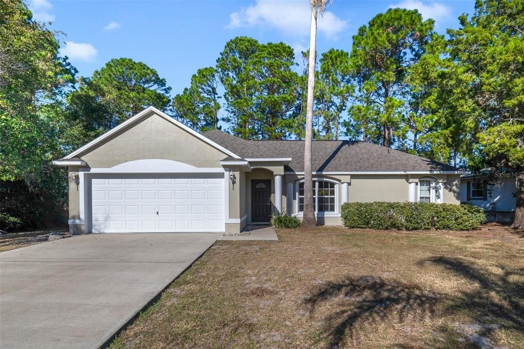 This established community central to Orlando and Daytona has a variety of local shopping, dining and recreation options and this 4BD/2BA home is ready and waiting for a new owner. On a large .30 ACRE / CUL-DE-SAC LOT with NEW ROOF (2024), FRESH INTERIOR & EXTERIOR PAINT (2024), an UPDATED RANGE & REFRIGERATOR (2019), no rear neighbors and WOODED VIEWS!