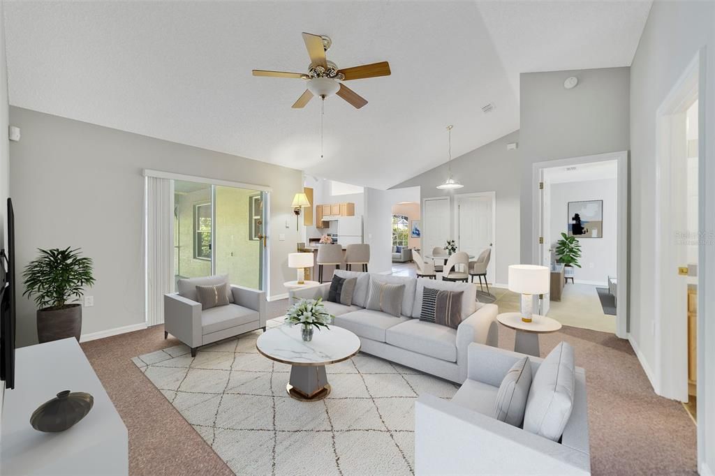 OPEN FAMILY ROOM/KITCHEN. Virtually Staged.