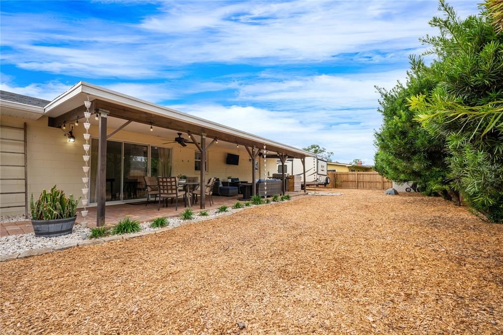 LARGE FENCED BACKYARD.