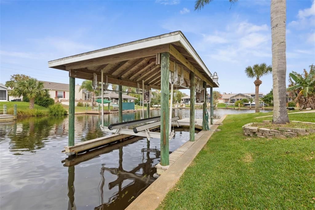 Boathouse with 8,000 lb boat lift.