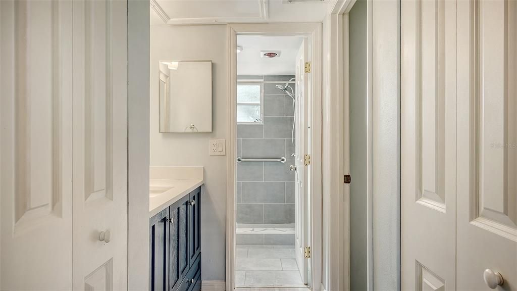 Entrance into sink & private bath area