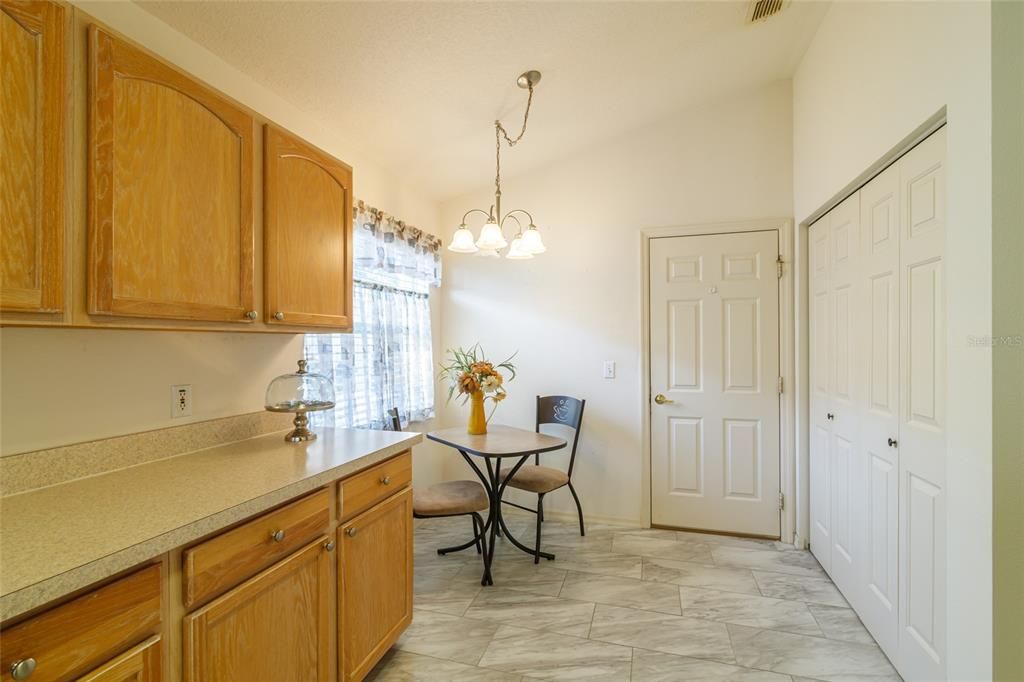 KITCHEN EATING AREA/DOOR TO GARAGE