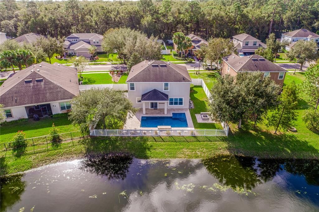 On a premier **.21 ACRE POND LOT** in Deland’s Saddlebrook community this spacious 5-bedroom, 3-full and 1-half bath home is outside of the hustle and bustle of Orlando while still being close to every convenience.