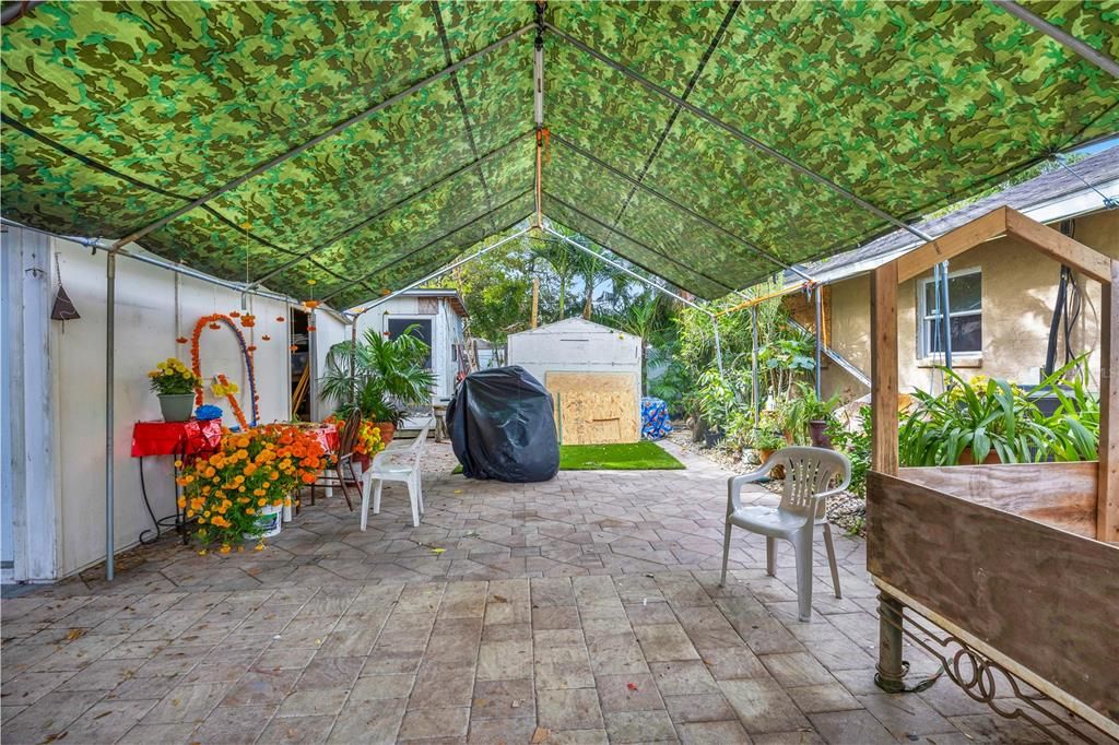 Canopy covers a majority of the back yard making it the perfect place to entertain.