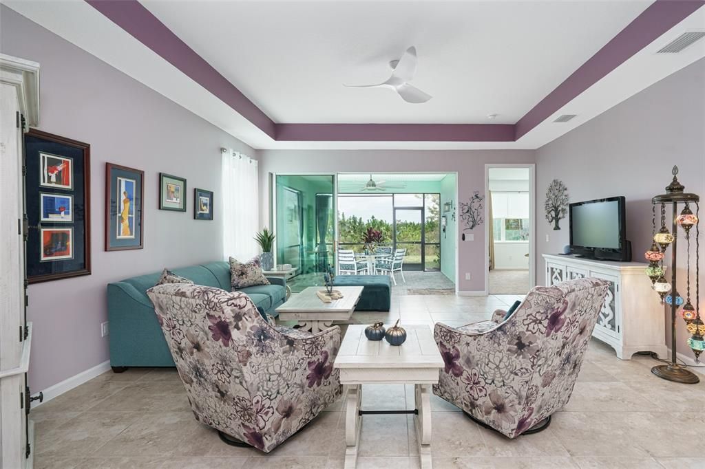 Great room that seemlessly flows out to the screened patio.