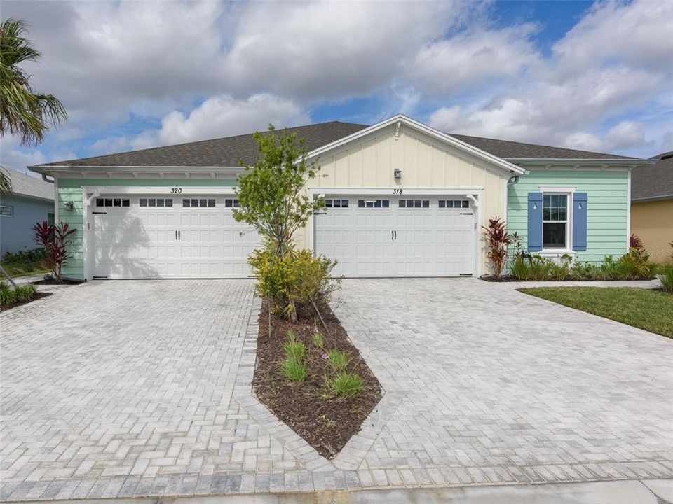 Longer driveway with no sidewalk.